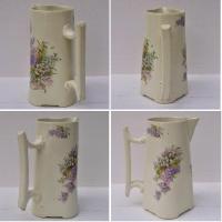 Ancien pichet pot a lait en faience a decor de bouquets de lilas et muguet sur fond blanc casse 2