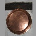 Plat en cuivre de forme ronde intérieur étamé