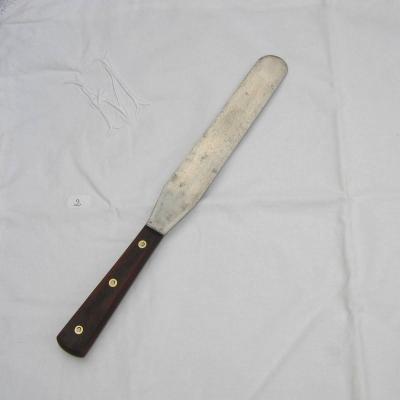 Ancienne spatule à pâtisserie estampillée Le Tip disque d'or
