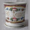 Ancienne tasse patronymique en porcelaine vieux paris